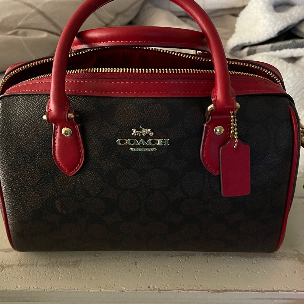 Coach Boston bag with detachable Crossbody strap.